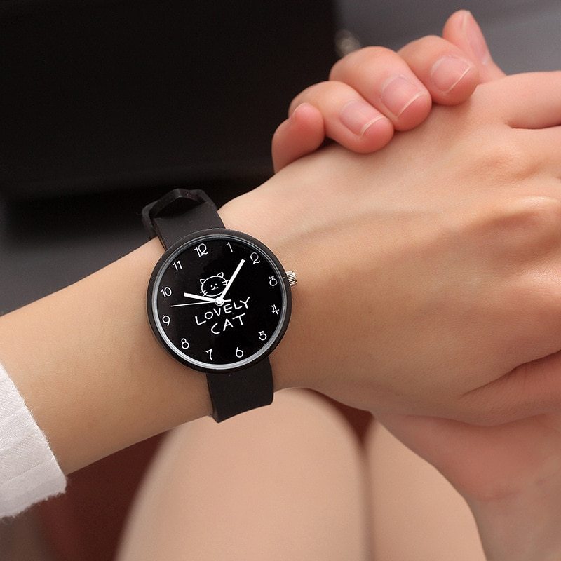 Add fun and style to your kid's wrist with this cute, colorful cat-themed silicone watch!  Color black face right