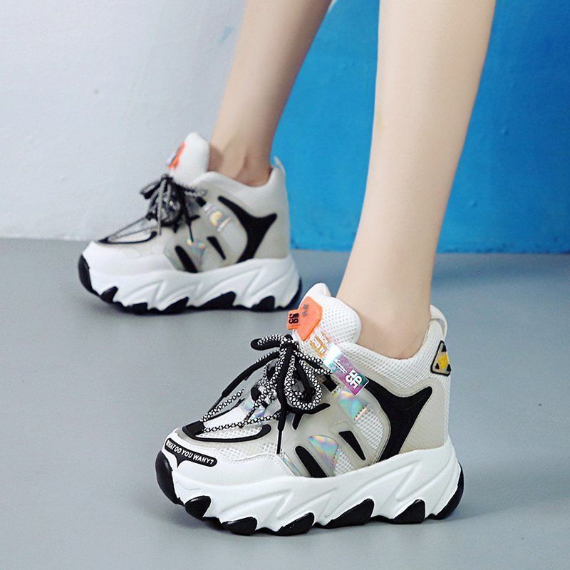 Step up your style game with breathable, height-boosting chunky sneakers—fashion meets comfort! Color's  are  white and black . face left  