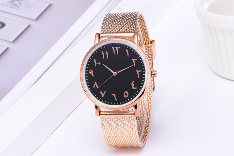 Elevate your style with our Creative Quartz, Couple, and Digital Mesh Band Watches. Shop now! Color's are golden and white  Face front left 
