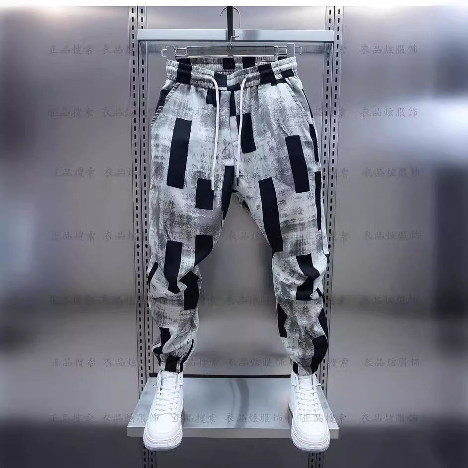 Stay stylish and comfortable with Men's Loose Casual Trousers – perfect for any casual outing!